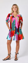 Field Study v-neck dress with puff sleeves and a swingy silhouette on model — CROSBY by Mollie Burch