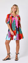 Field Study v-neck dress with puff sleeves and a swingy silhouette on model — CROSBY by Mollie Burch