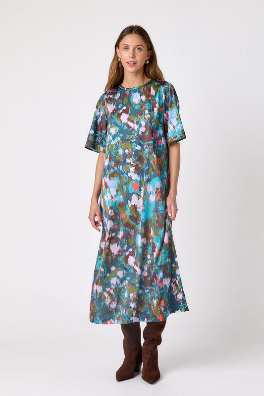 Florentine Marble short sleeve ankle-length dress with a straight fit on model – CROSBY by Mollie Burch
