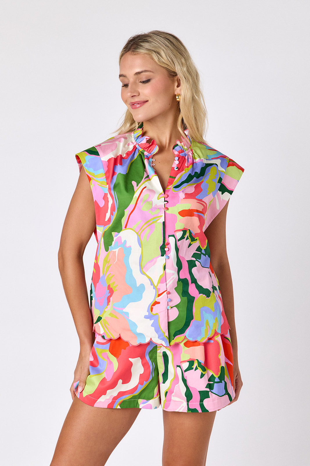 Flutter tailored shorts with belt on model — CROSBY by Mollie Burch