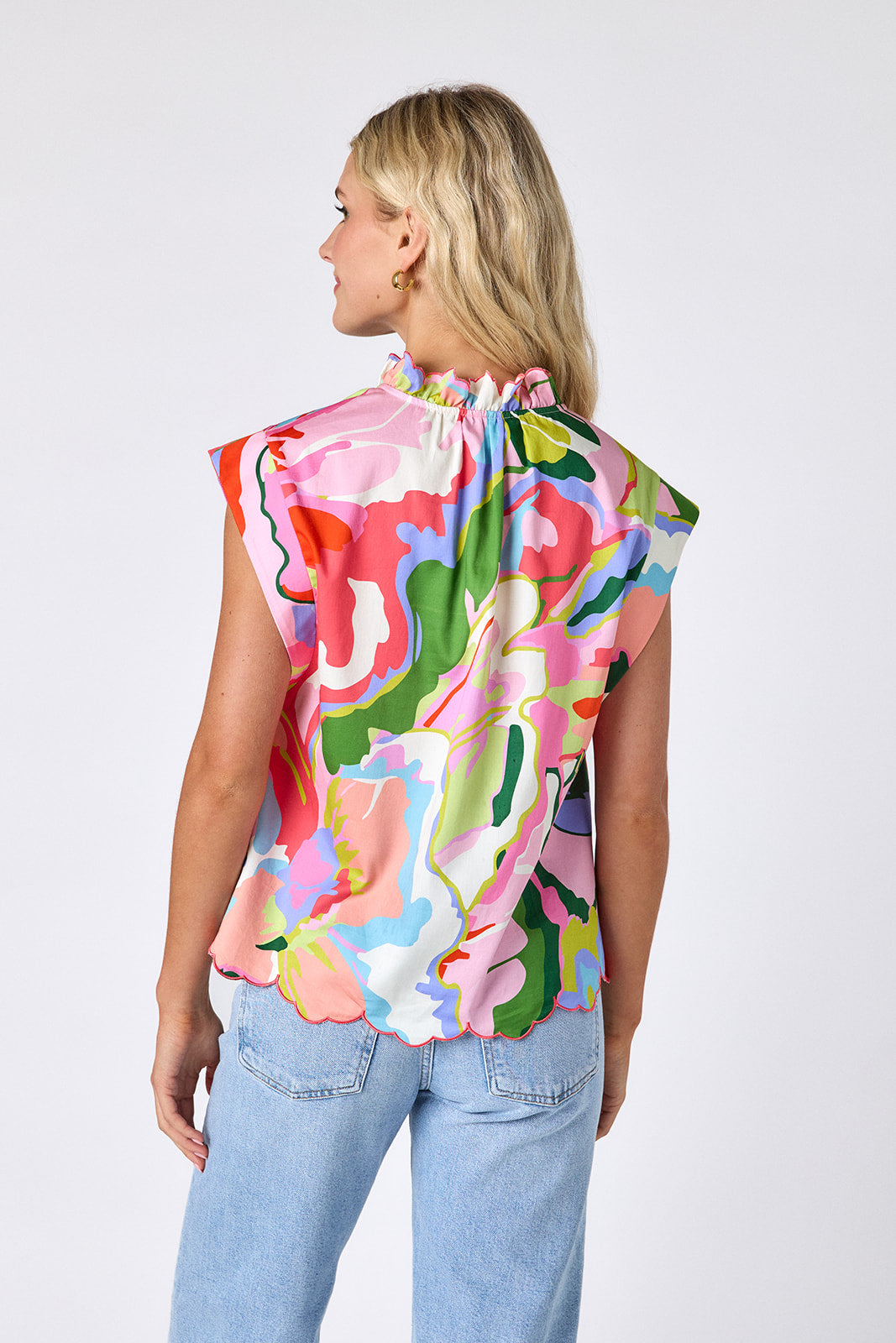 Flutter cotton top with scallop detail on model — CROSBY by Mollie Burch