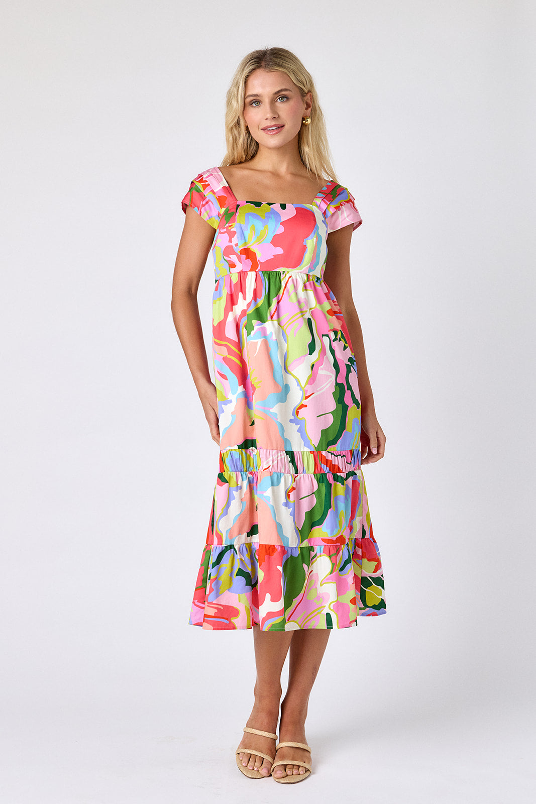 Flutter midi dress with square neckline and tiered skirt on model — CROSBY by Mollie Burch