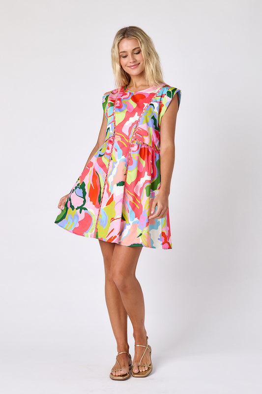 Flutter mini dress with fagoting detail on model — CROSBY by Mollie Burch