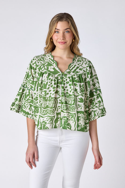 Gardener cotton top with scallop neckline and button-down front on model — CROSBY by Mollie Burch