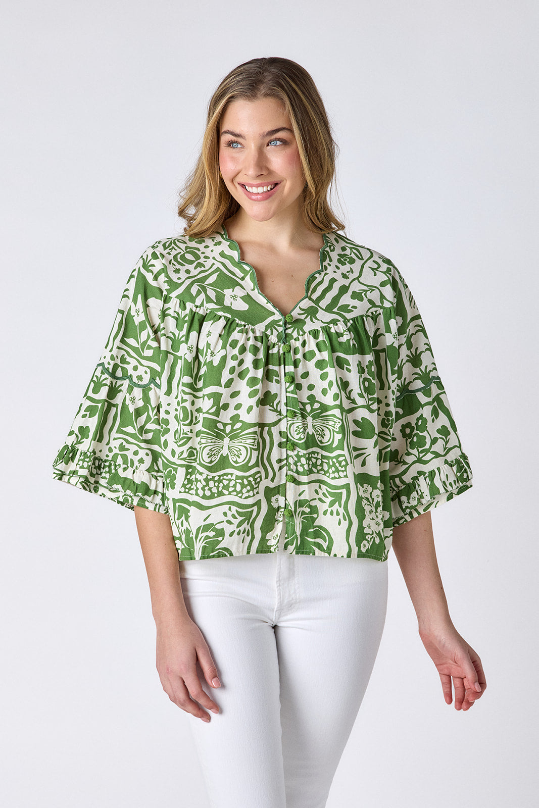 Gardener cotton top with scallop neckline and button-down front on model — CROSBY by Mollie Burch