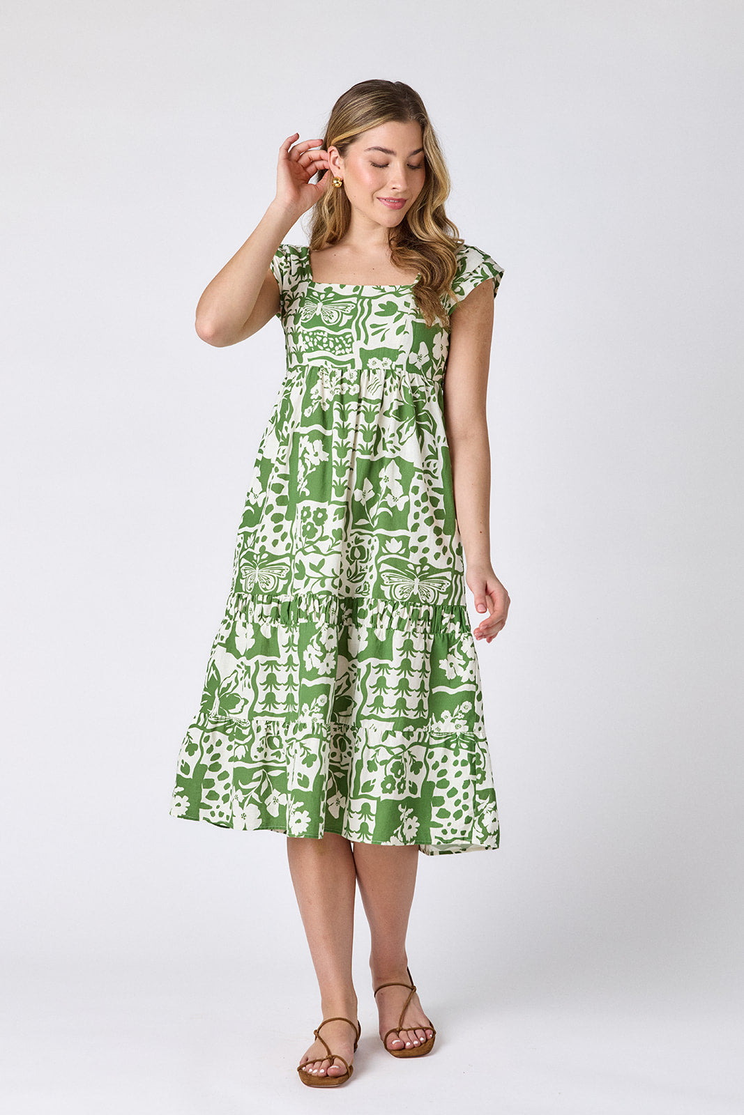 Gardener midi dress with square neckline and tiered skirt on model — CROSBY by Mollie Burch