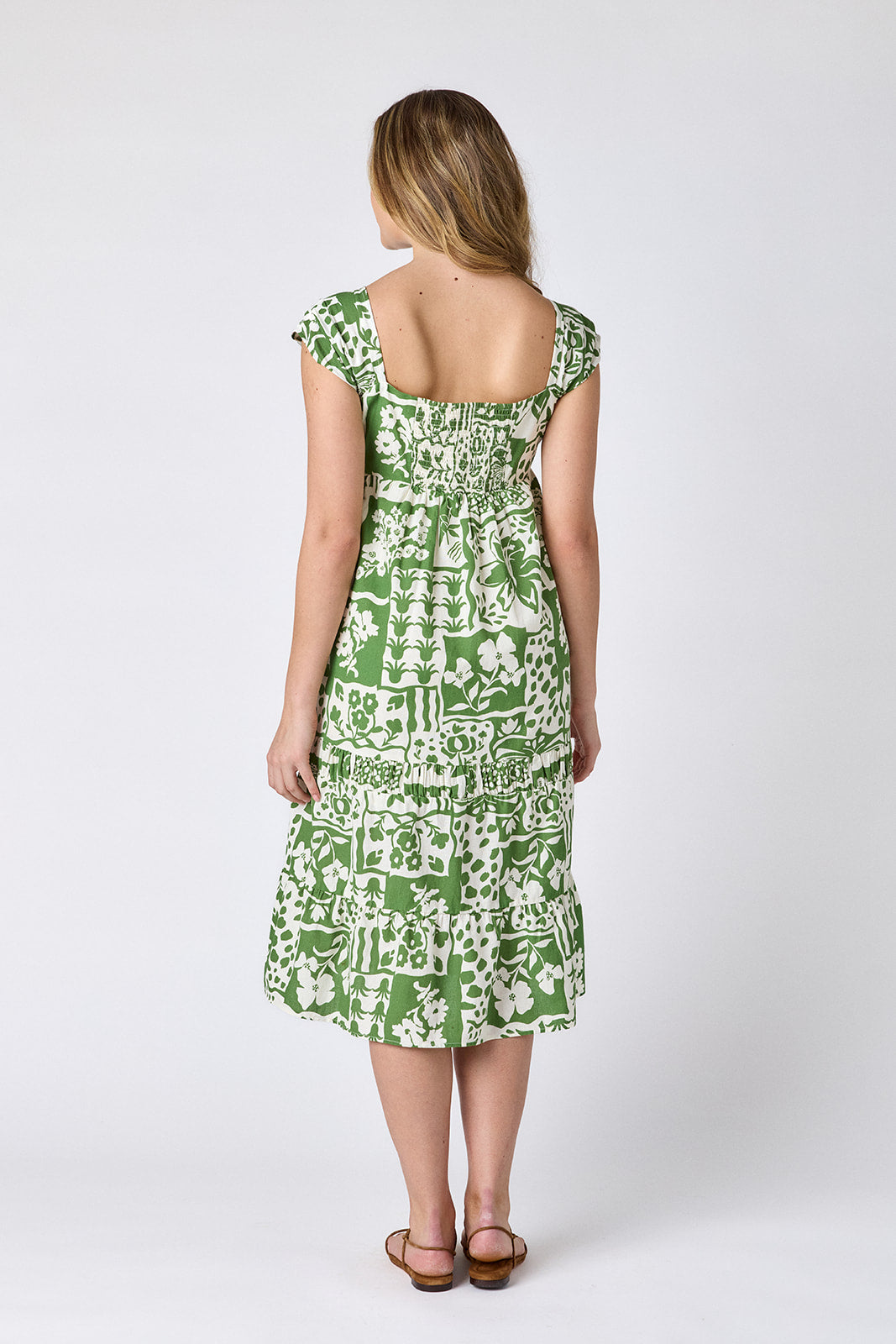Gardener midi dress with square neckline and tiered skirt on model — CROSBY by Mollie Burch