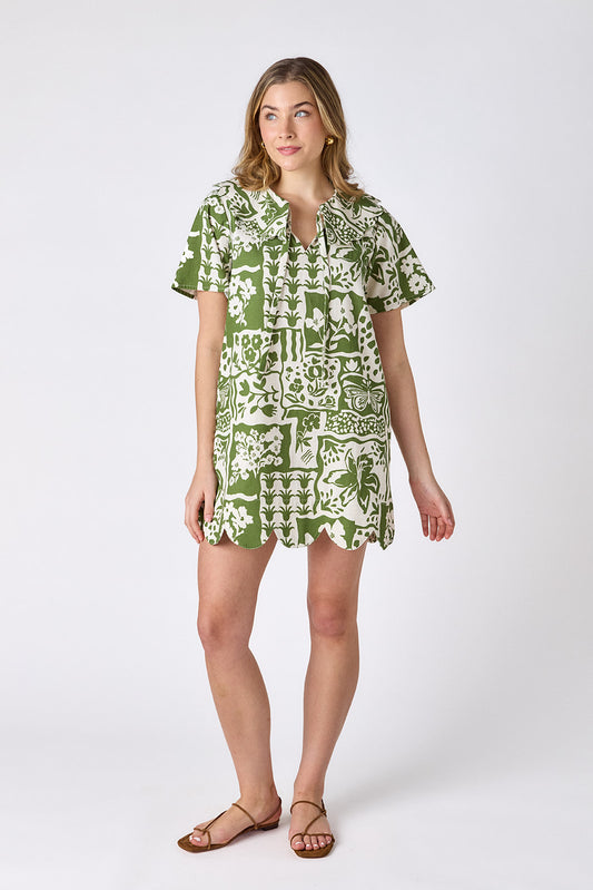 Gardener mini dress with scalloped collar and hem on model — CROSBY by Mollie Burch