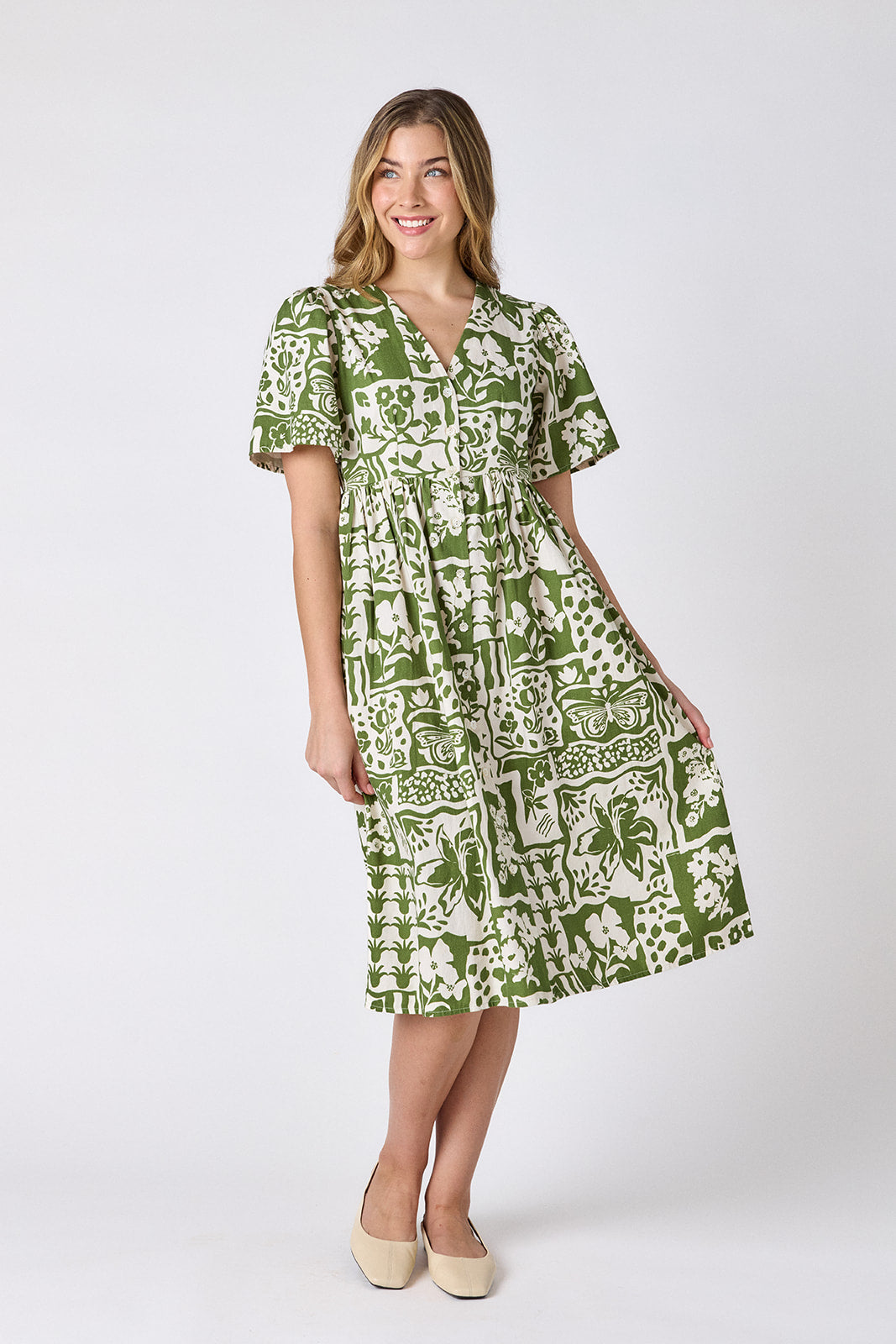 Gardener button-down midi dress with V-neck and short sleeves on model — CROSBY by Mollie Burch