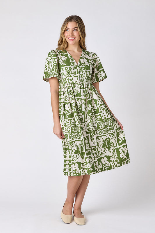 Gardener button-down midi dress with V-neck and short sleeves on model — CROSBY by Mollie Burch