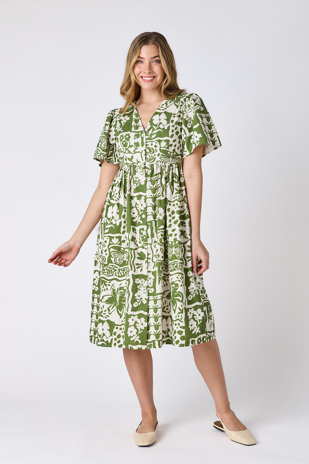 Gardener button-down midi dress with V-neck and short sleeves on model — CROSBY by Mollie Burch