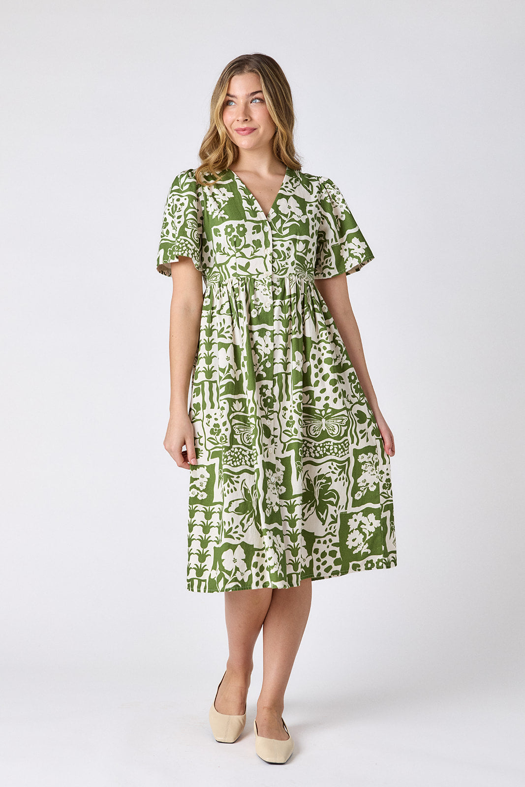 Gardener button-down midi dress with V-neck and short sleeves on model — CROSBY by Mollie Burch