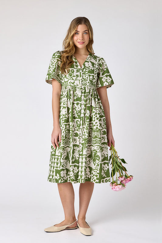 Gardener button-down midi dress with V-neck and short sleeves on model — CROSBY by Mollie Burch