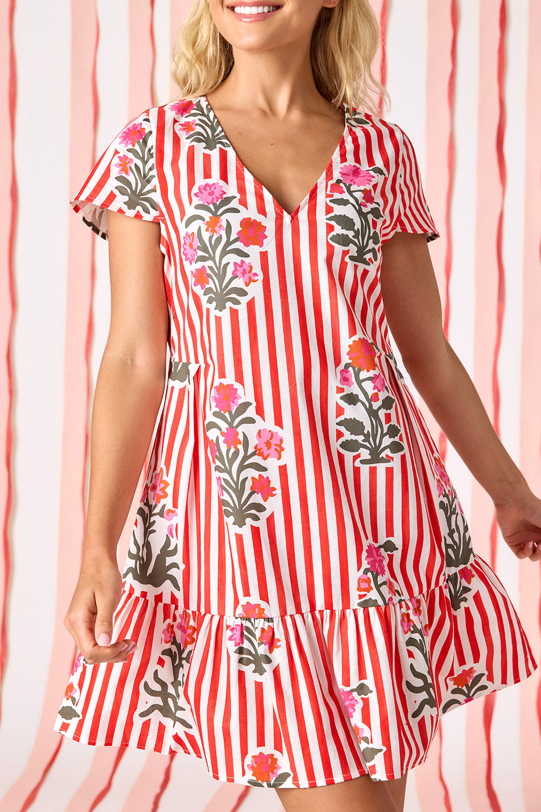 Garden Parasol V-neck short sleeve dress with flounce on model — CROSBY by Mollie Burch