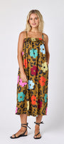 Happy Leopard tent style dress with smocking on model — CROSBY by Mollie Burch