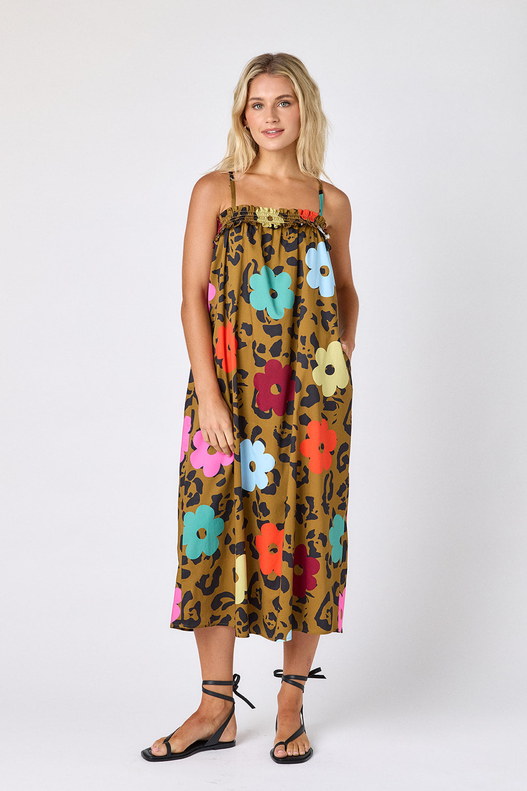 Happy Leopard tent style dress with smocking on model — CROSBY by Mollie Burch