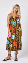 Happy Leopard tent style dress with smocking on model — CROSBY by Mollie Burch