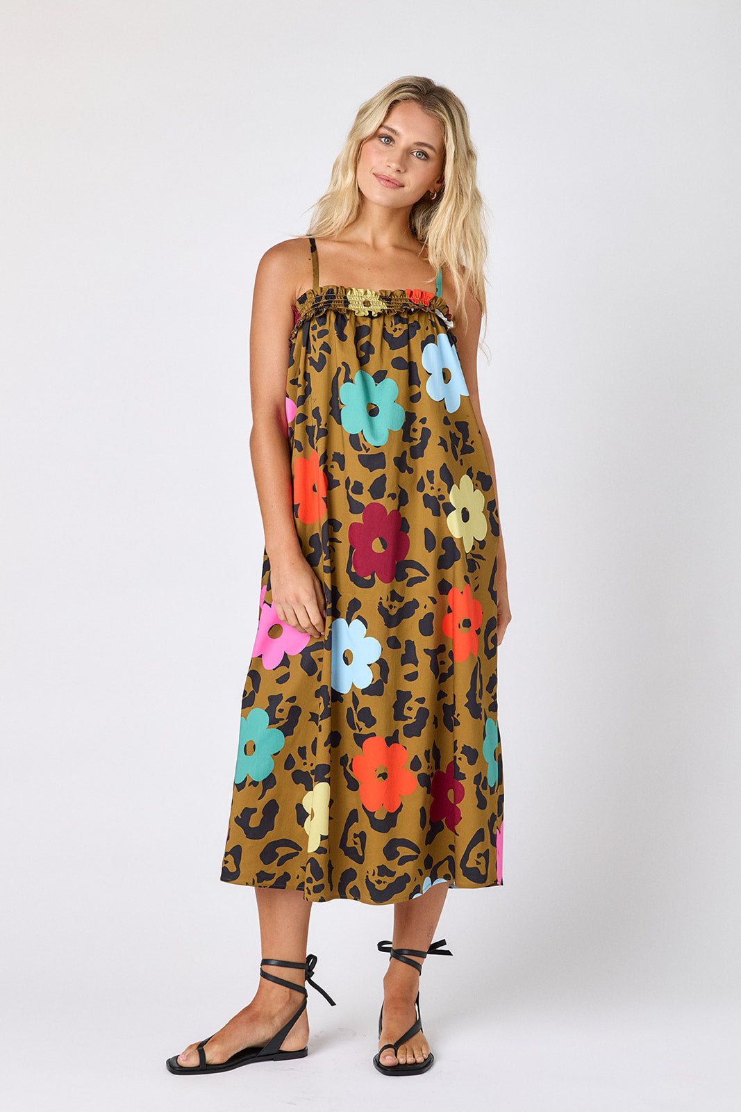 Happy Leopard tent style dress with smocking on model — CROSBY by Mollie Burch