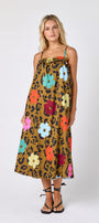 Happy Leopard tent style dress with smocking on model — CROSBY by Mollie Burch