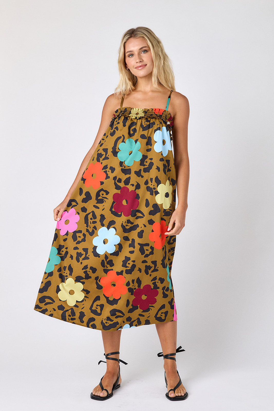 Happy Leopard tent style dress with smocking on model — CROSBY by Mollie Burch