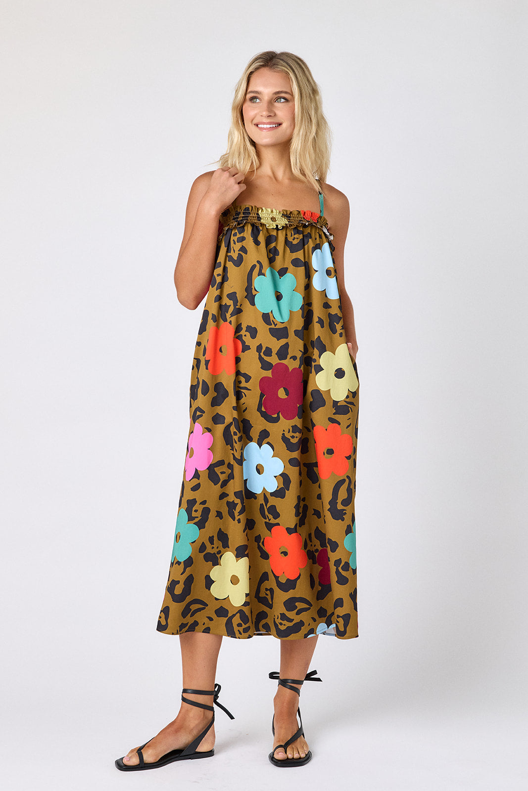 Happy Leopard tent style dress with smocking on model — CROSBY by Mollie Burch