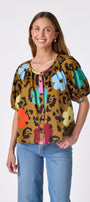 Happy Leopard button front top with balloon sleeves on model — CROSBY by Mollie Burch