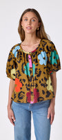 Happy Leopard button front top with balloon sleeves on model — CROSBY by Mollie Burch