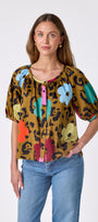 Happy Leopard button front top with balloon sleeves on model — CROSBY by Mollie Burch