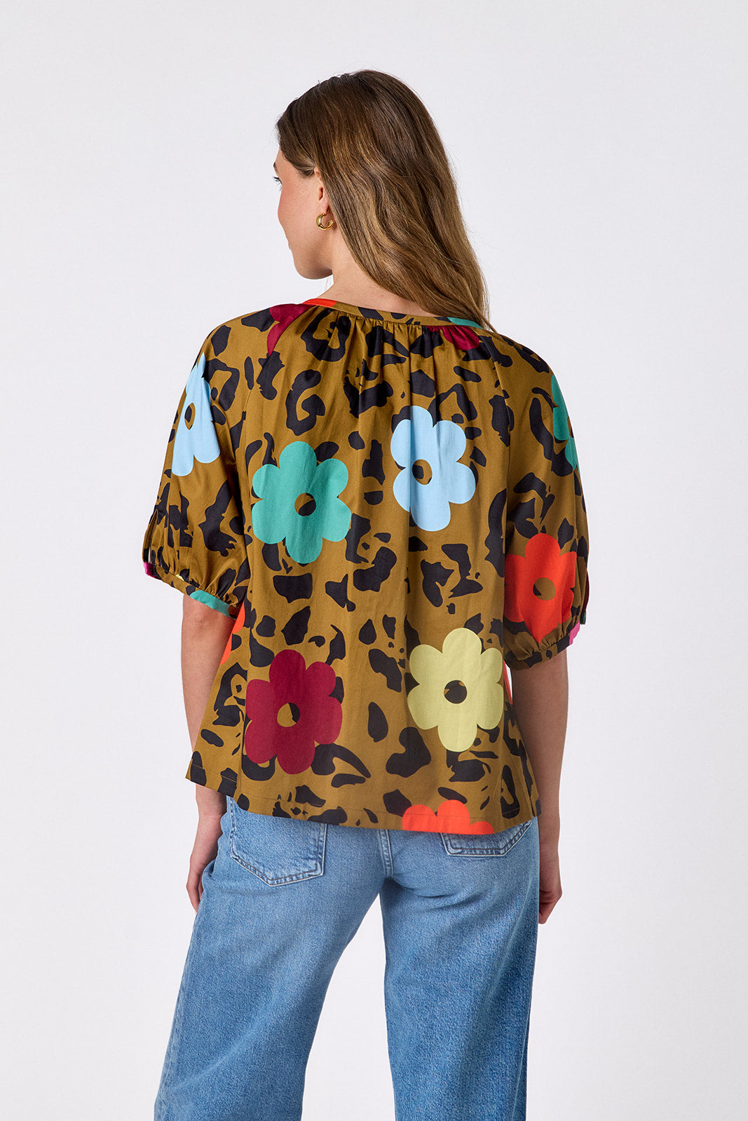 Happy Leopard button front top with balloon sleeves on model — CROSBY by Mollie Burch