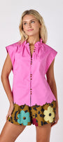Happy Leopard shorts with Poppy Pink raglan top with scallop detail on model — CROSBY by Mollie Burch