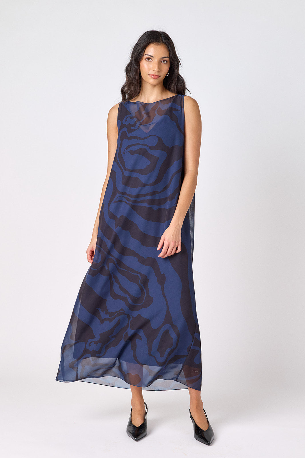 Ink Wave tent-style sleeveless dress with sheer overlay on model – CROSBY by Mollie Burch
