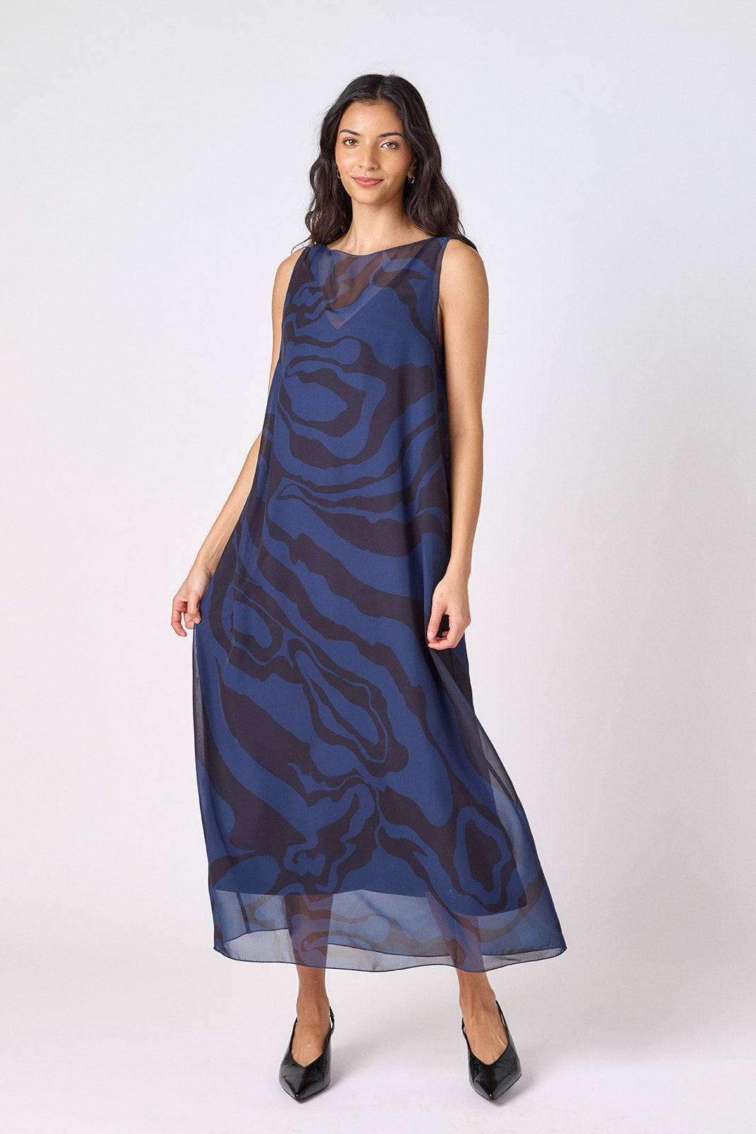 Ink Wave tent-style sleeveless dress with sheer overlay on model – CROSBY by Mollie Burch