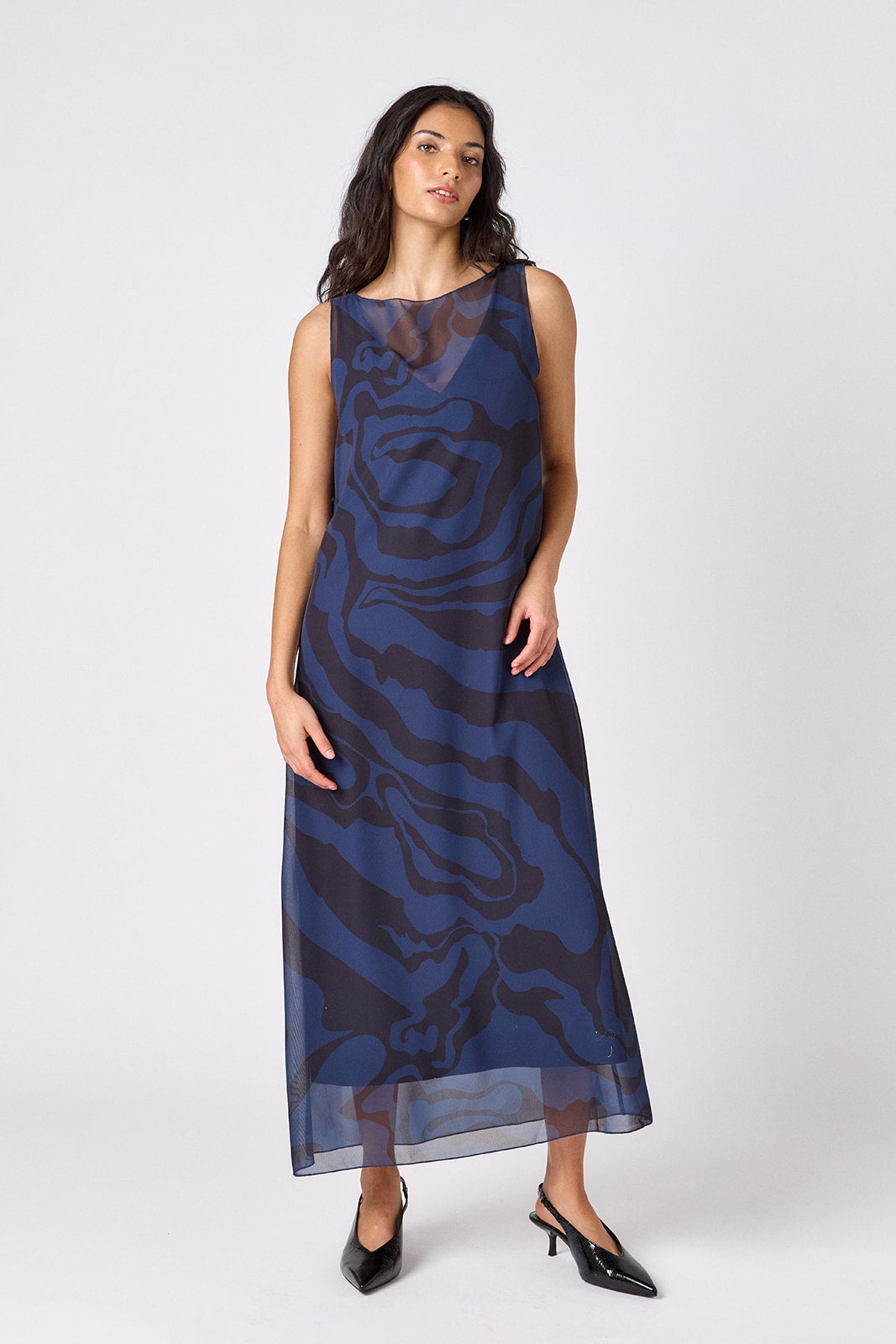 Ink Wave tent-style sleeveless dress with sheer overlay on model – CROSBY by Mollie Burch