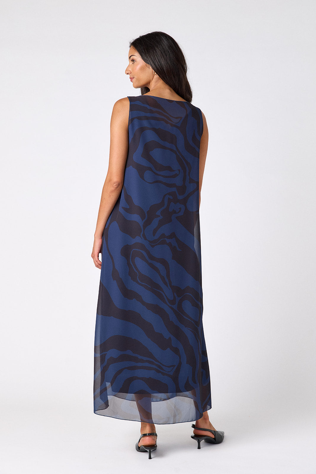 Ink Wave tent-style sleeveless dress with sheer overlay on model – CROSBY by Mollie Burch