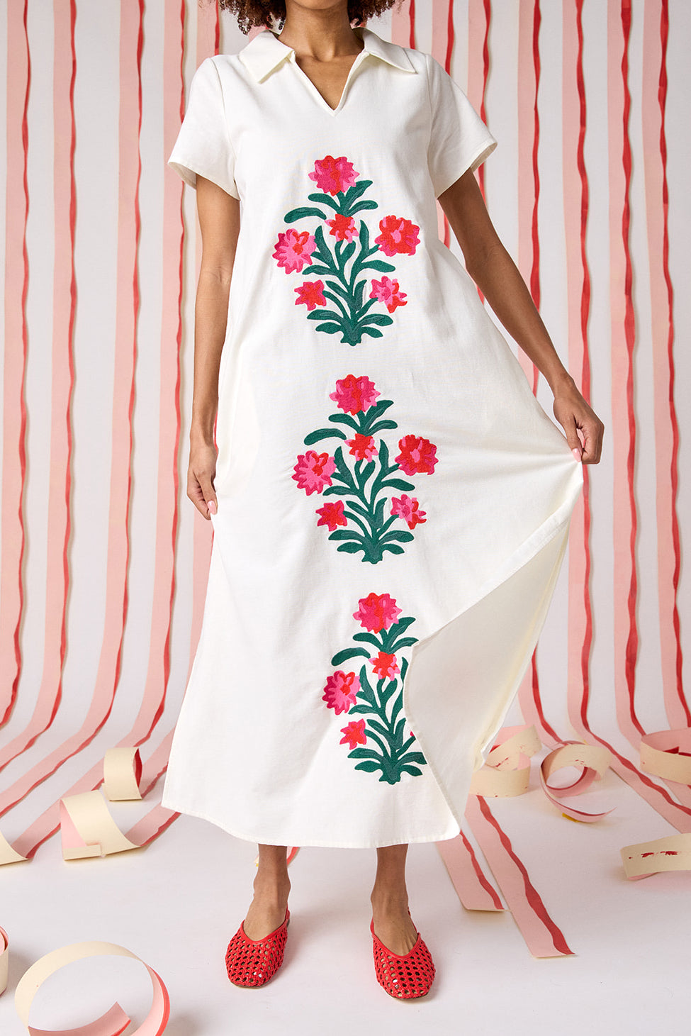 Ivory short sleeve A-line split collared dress with embroidery detail on model — CROSBY by Mollie Burch