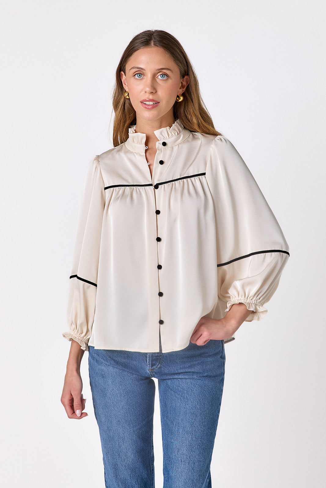 Ivory flowy ¾ sleeve blouse on model – CROSBY by Mollie Burch