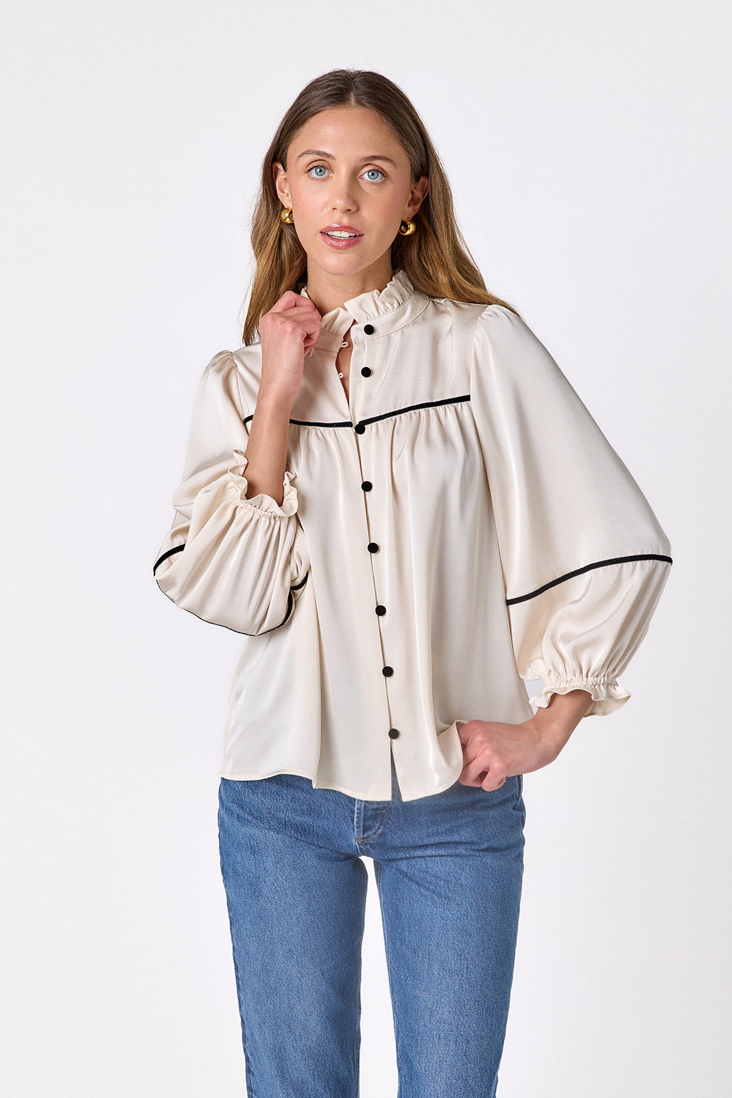 Ivory flowy ¾ sleeve blouse on model – CROSBY by Mollie Burch