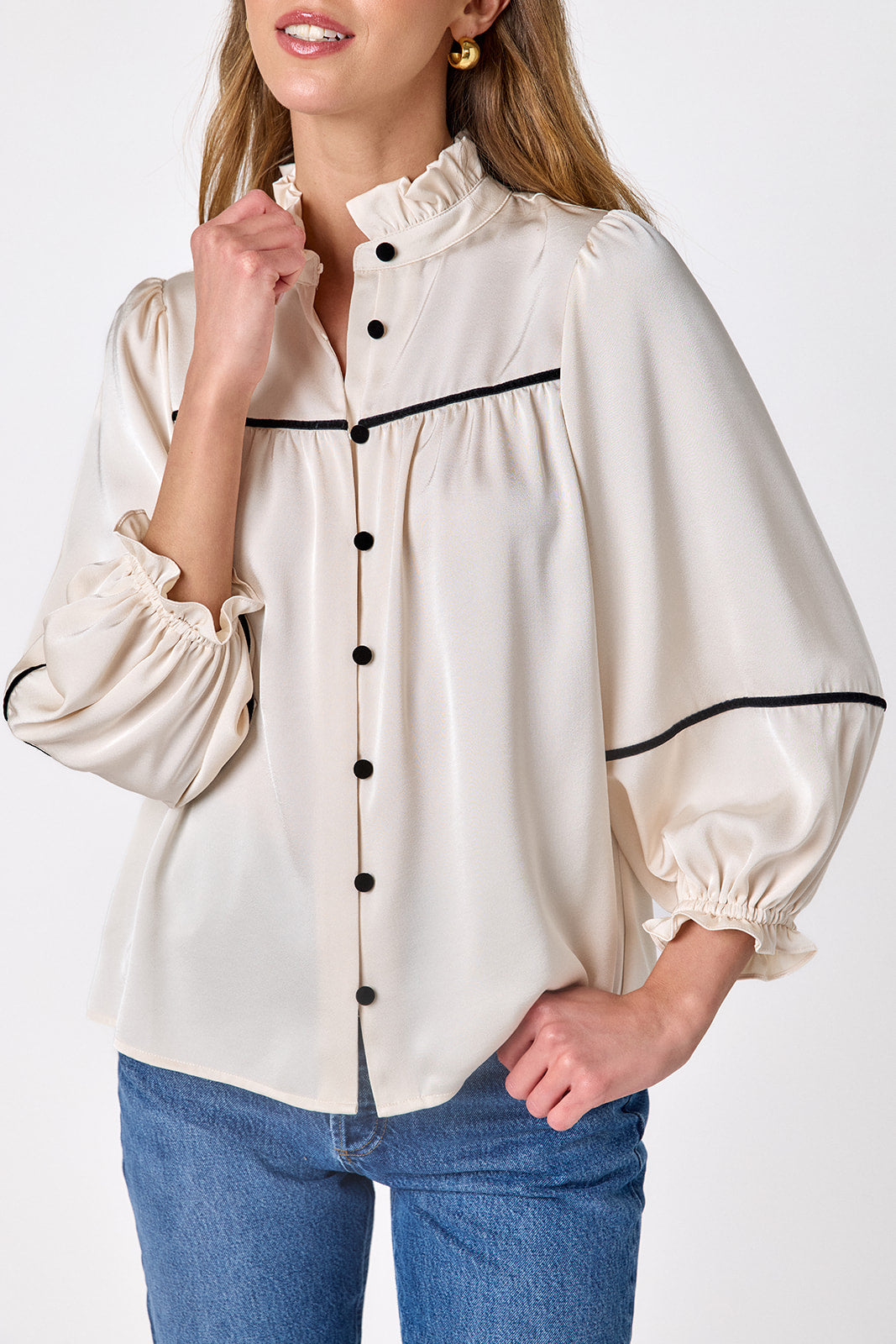 Ivory flowy ¾ sleeve blouse on model – CROSBY by Mollie Burch
