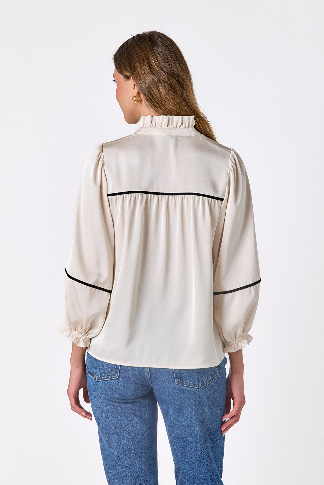 Ivory flowy ¾ sleeve blouse on model – CROSBY by Mollie Burch