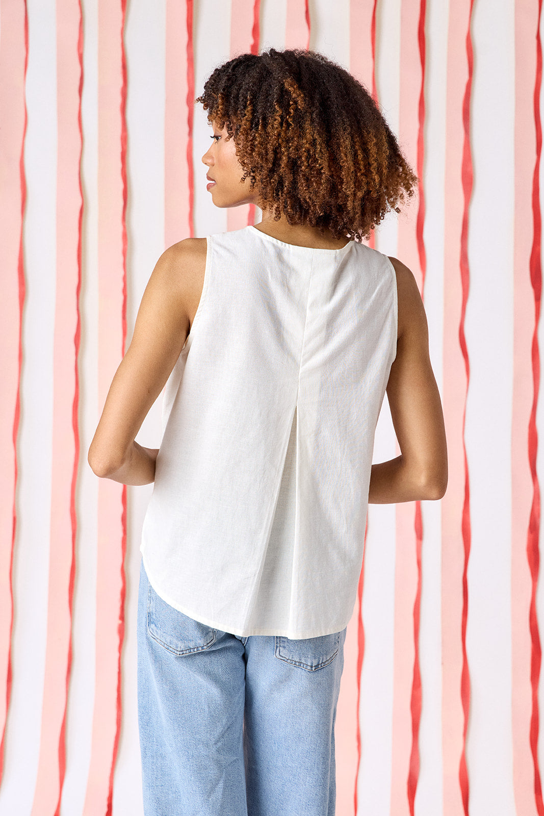 Ivory boxy a-line tank top with embroidery on model — CROSBY by Mollie Burch