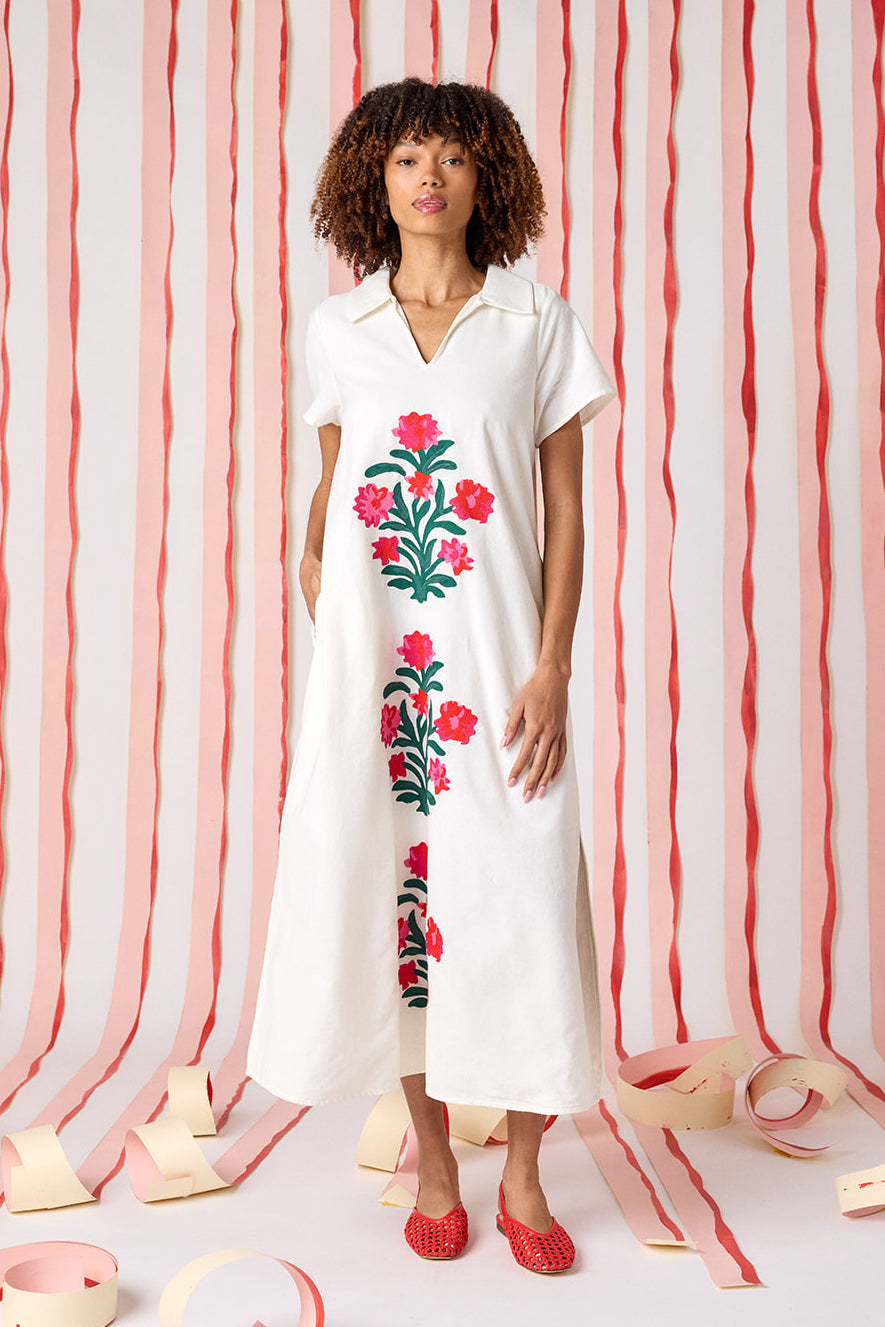 Ivory short sleeve A-line split collared dress with embroidery detail on model — CROSBY by Mollie Burch