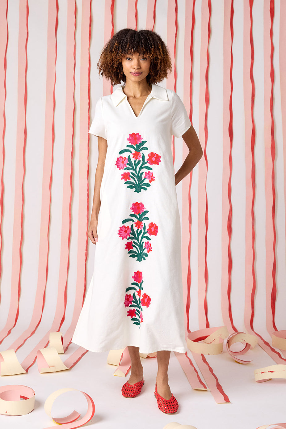 Ivory short sleeve A-line split collared dress with embroidery detail on model — CROSBY by Mollie Burch