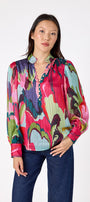 Leland Blouse in Life of the Party featuring puff sleeves and milky pink, gold-rimmed buttons on model – CROSBY by Mollie Burch
