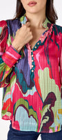 Leland Blouse in Life of the Party featuring puff sleeves and milky pink, gold-rimmed buttons on model – CROSBY by Mollie Burch