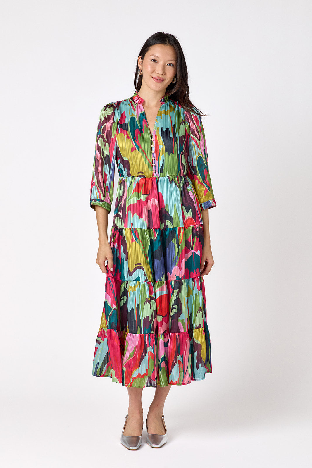 Macrostie Dress in Life of the Party featuring a tiered midi skirt and gold-accented buttons on model – CROSBY by Mollie Burch