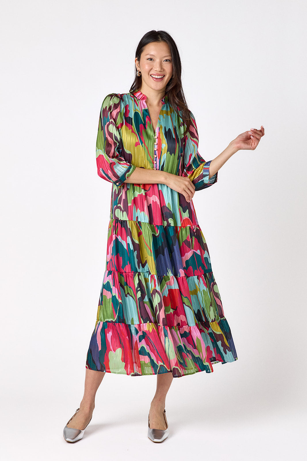 Macrostie Dress in Life of the Party featuring a tiered midi skirt and gold-accented buttons on model – CROSBY by Mollie Burch