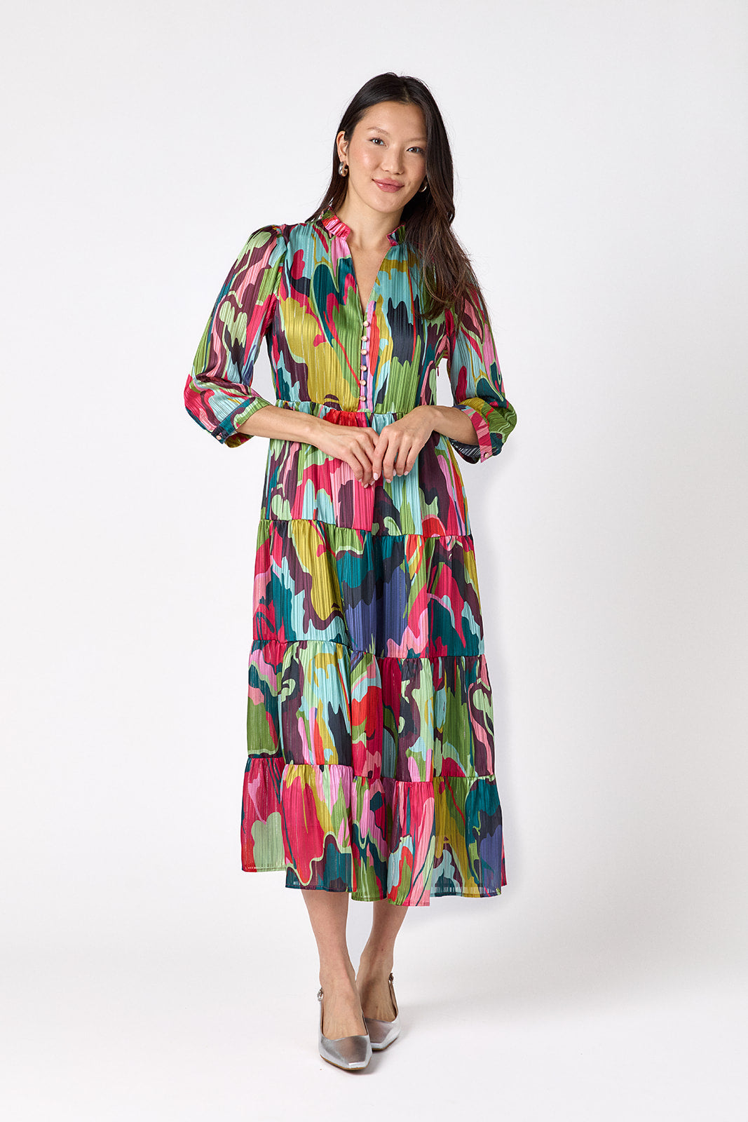 Macrostie Dress in Life of the Party featuring a tiered midi skirt and gold-accented buttons on model – CROSBY by Mollie Burch