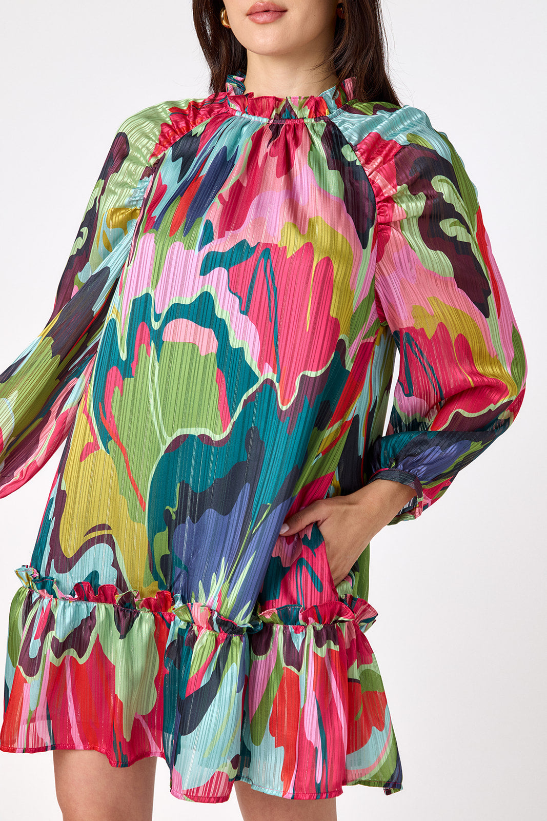 Flynn Dress in Life of the Party featuring puff sleeves and ruffle detailing on model – CROSBY by Mollie Burch