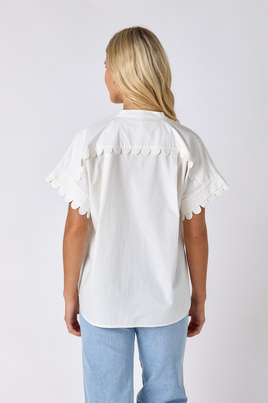 Magnolia scalloped tunic top on model — CROSBY by Mollie Burch