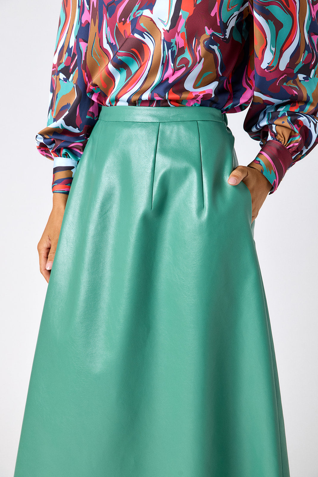 Malachite voluminous faux leather A-line skirt on model – CROSBY by Mollie Burch